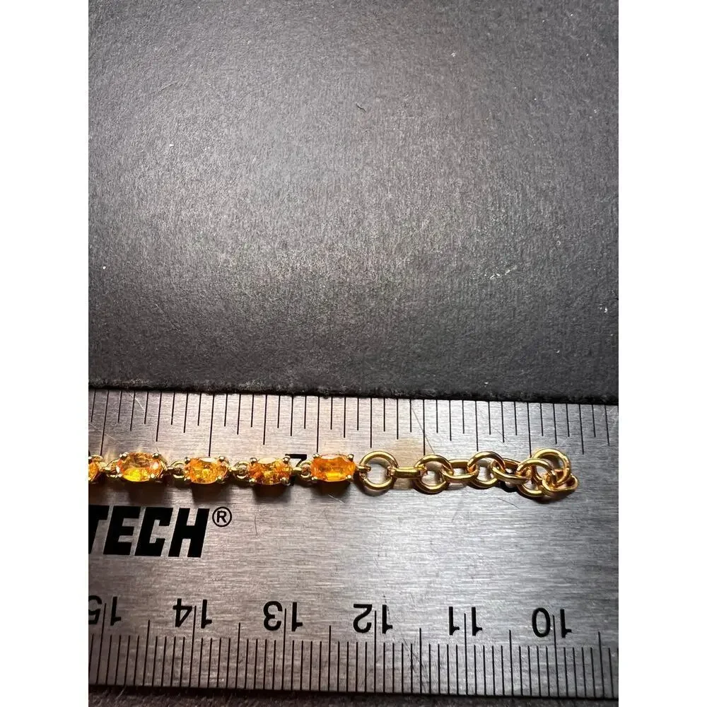 Yellow spessartine garnet tennis bracelet in gold over sterling silver